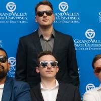 Student team wearing sunglasses